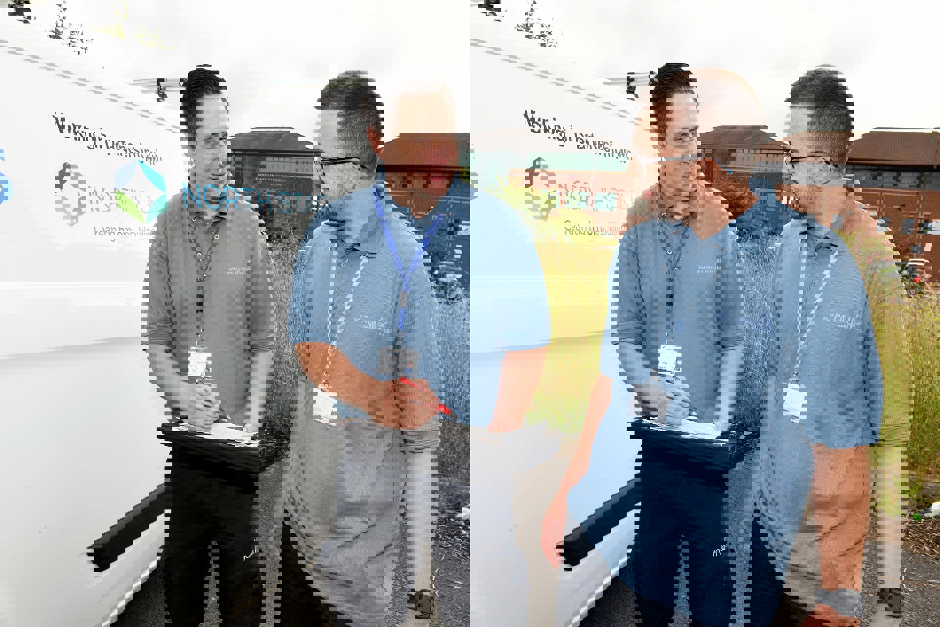 Two men from Ian Williams looking at a clipboard.